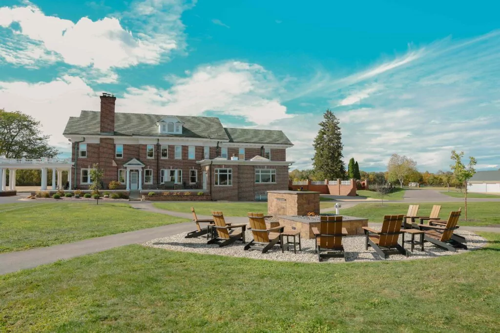 Front facade of the brick residence hall on The Grove Estate campus in Peru, Indiana