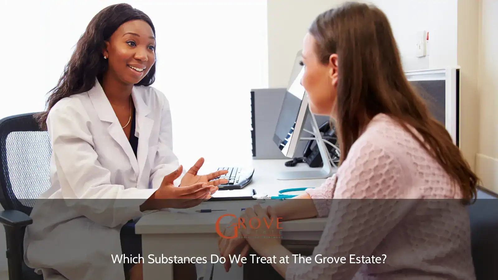 Medical professional discussing treatment options with a patient at The Grove Estate, focusing on personalized care and support.