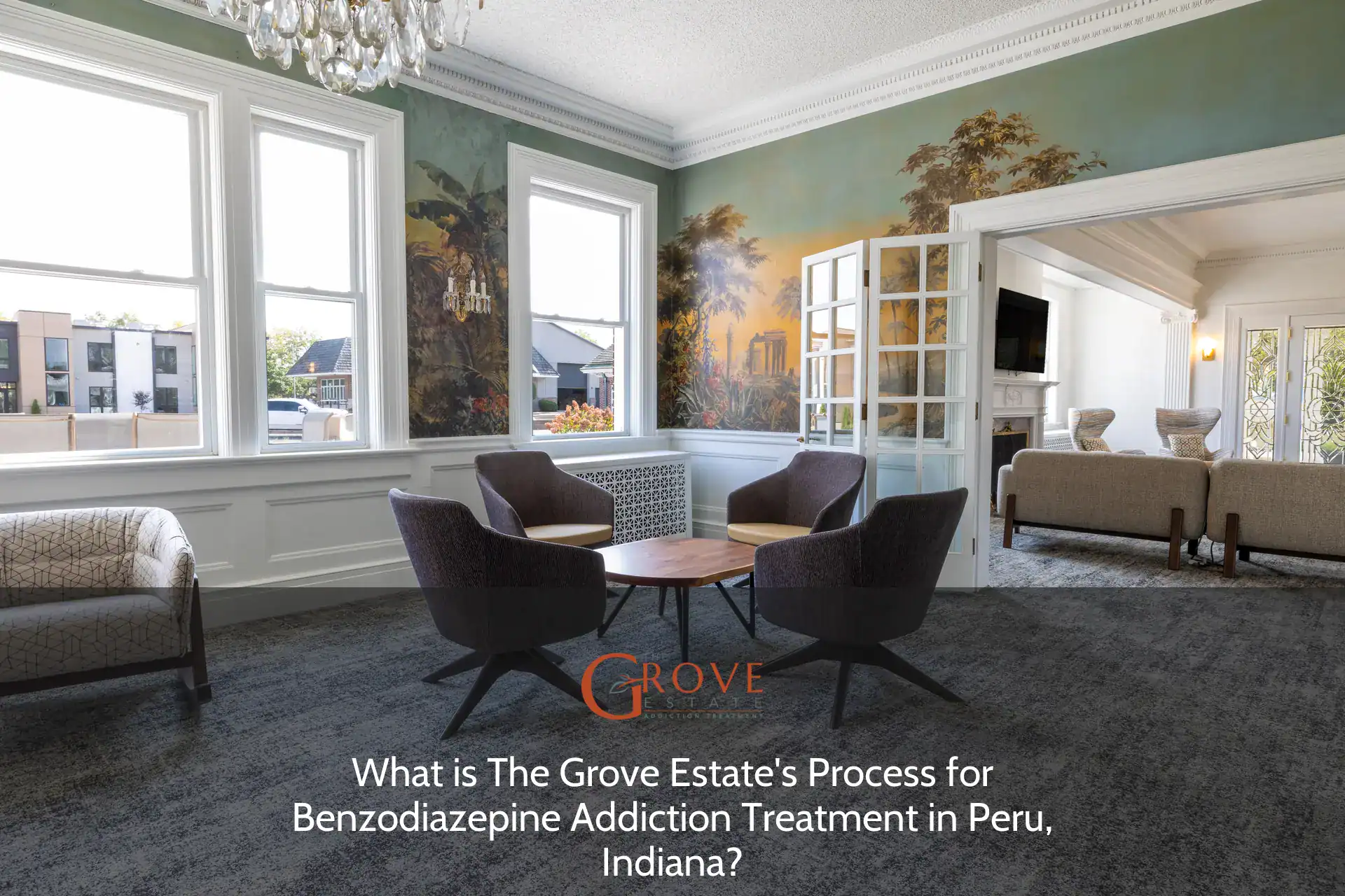 Brightly lit sitting area featuring modern furniture and a striking mural, highlighting The Grove Estate's calming environment for benzodiazepine addiction treatment in Peru, Indiana.