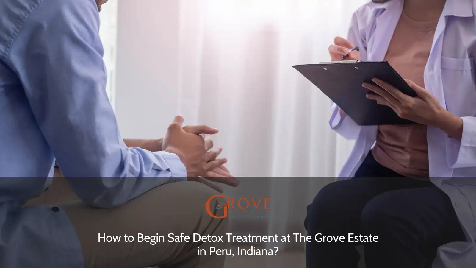 Patient and clinician engaged in discussion, focusing on detox treatment options at The Grove Estate in Peru, Indiana. Clipboard notes visible in the session.