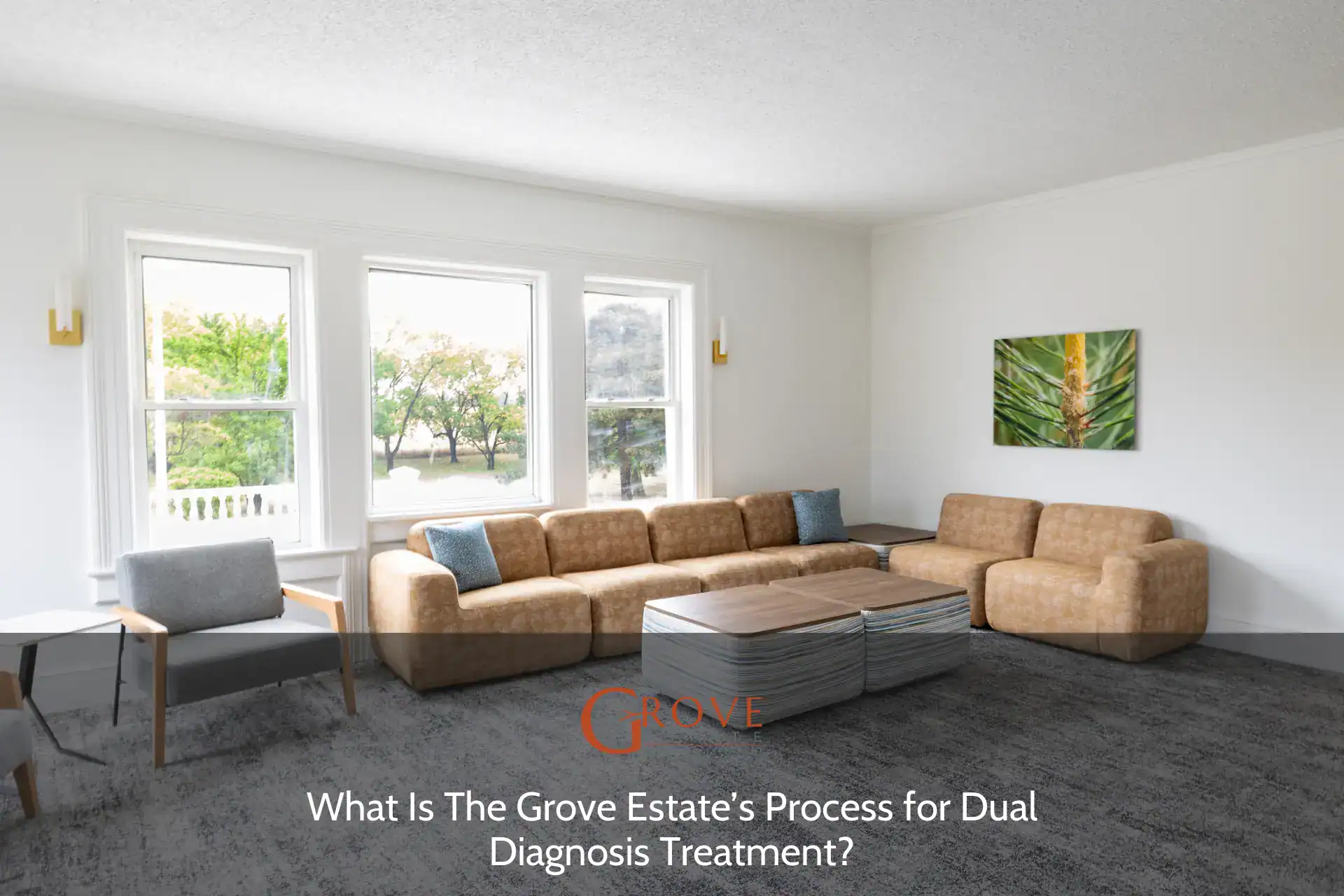 Bright and inviting lounge area featuring a spacious sectional sofa, accent chairs, and a wooden coffee table, with views of greenery through large windows.