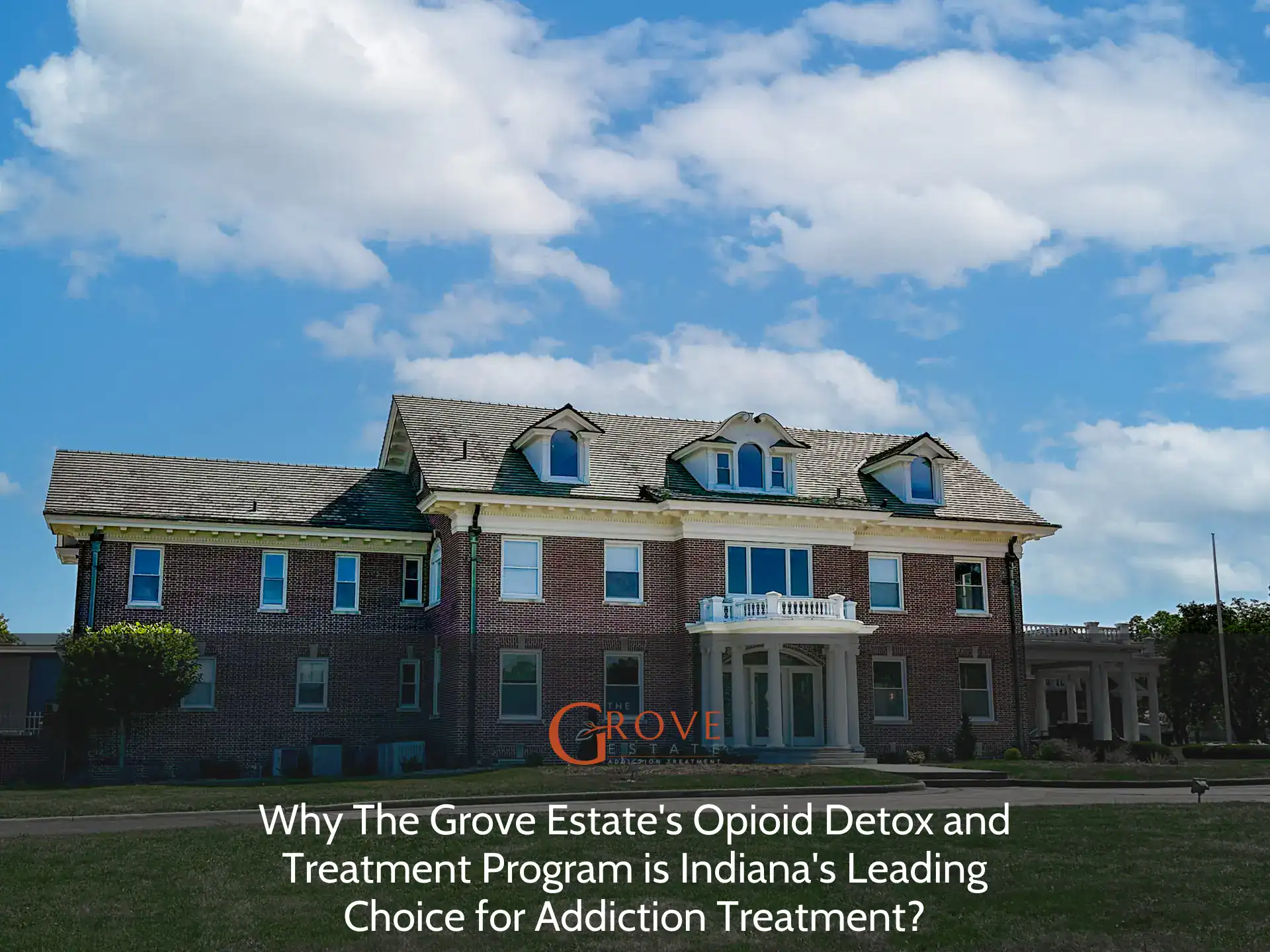 Historic brick building of The Grove Estate, showcasing elegant architecture and manicured grounds, a prime location for addiction treatment in Indiana.
